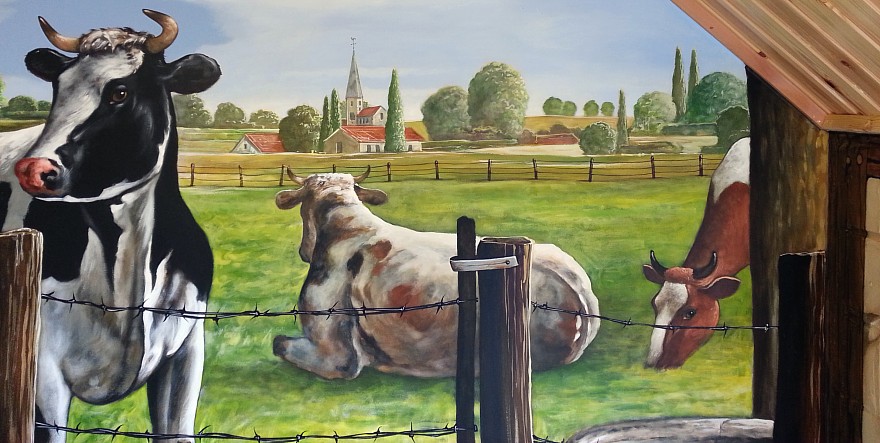 overzicht muurschildering met koeien
